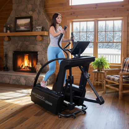 Body-Solid Endurance E5000 Premium Center Drive Elliptical woman exercising