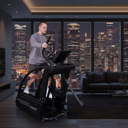 Body-Solid Endurance E5000 Premium Center Drive Elliptical man exercising