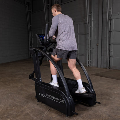 Body-Solid Endurance E5000 Premium Center Drive Elliptical man exercising