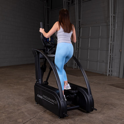 Body-Solid Endurance E5000 Premium Center Drive Elliptical woman exercising
