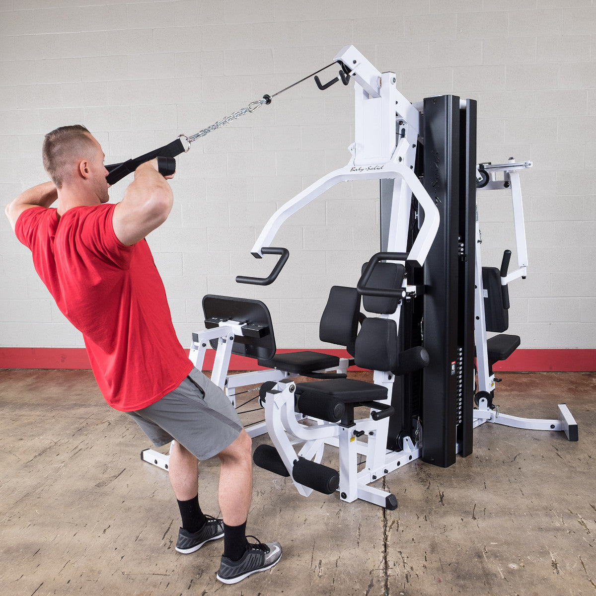 Body-Solid EXM3000LPS Dual Stack Home Gym with Leg Press exercise