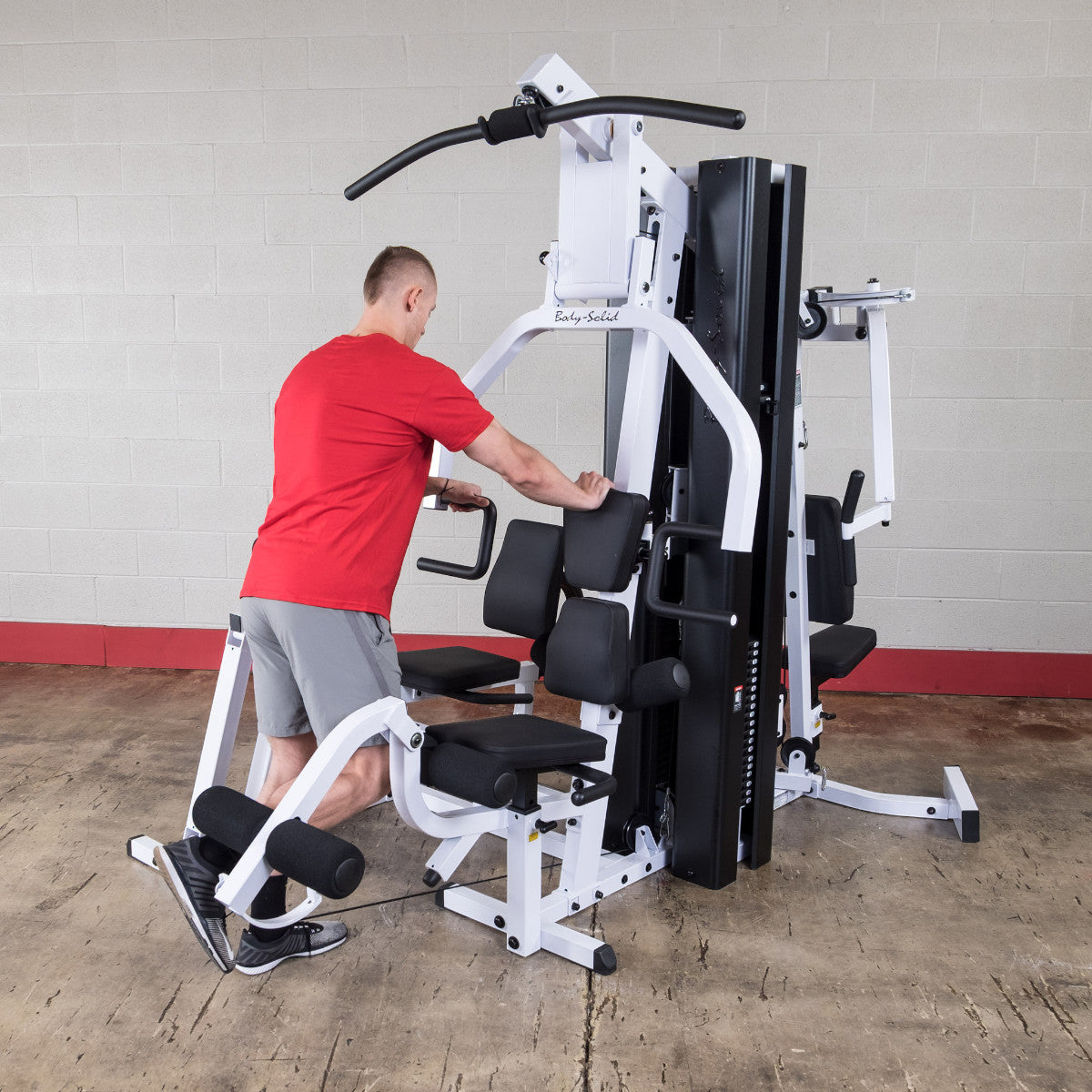 Body-Solid EXM3000LPS Dual Stack Home Gym with Leg Press exercise