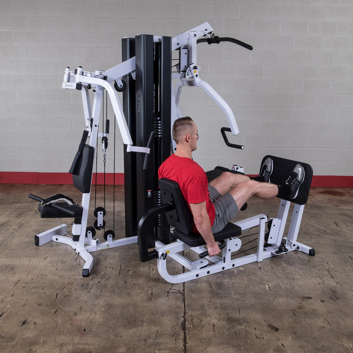 Body-Solid EXM3000LPS Dual Stack Home Gym with Leg Press exercise