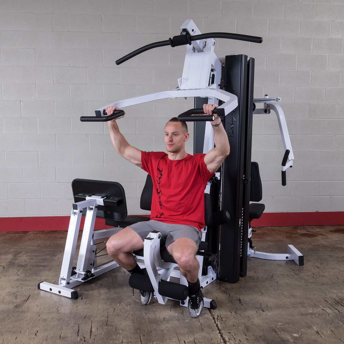 Body-Solid EXM3000LPS Dual Stack Home Gym with Leg Press exercise