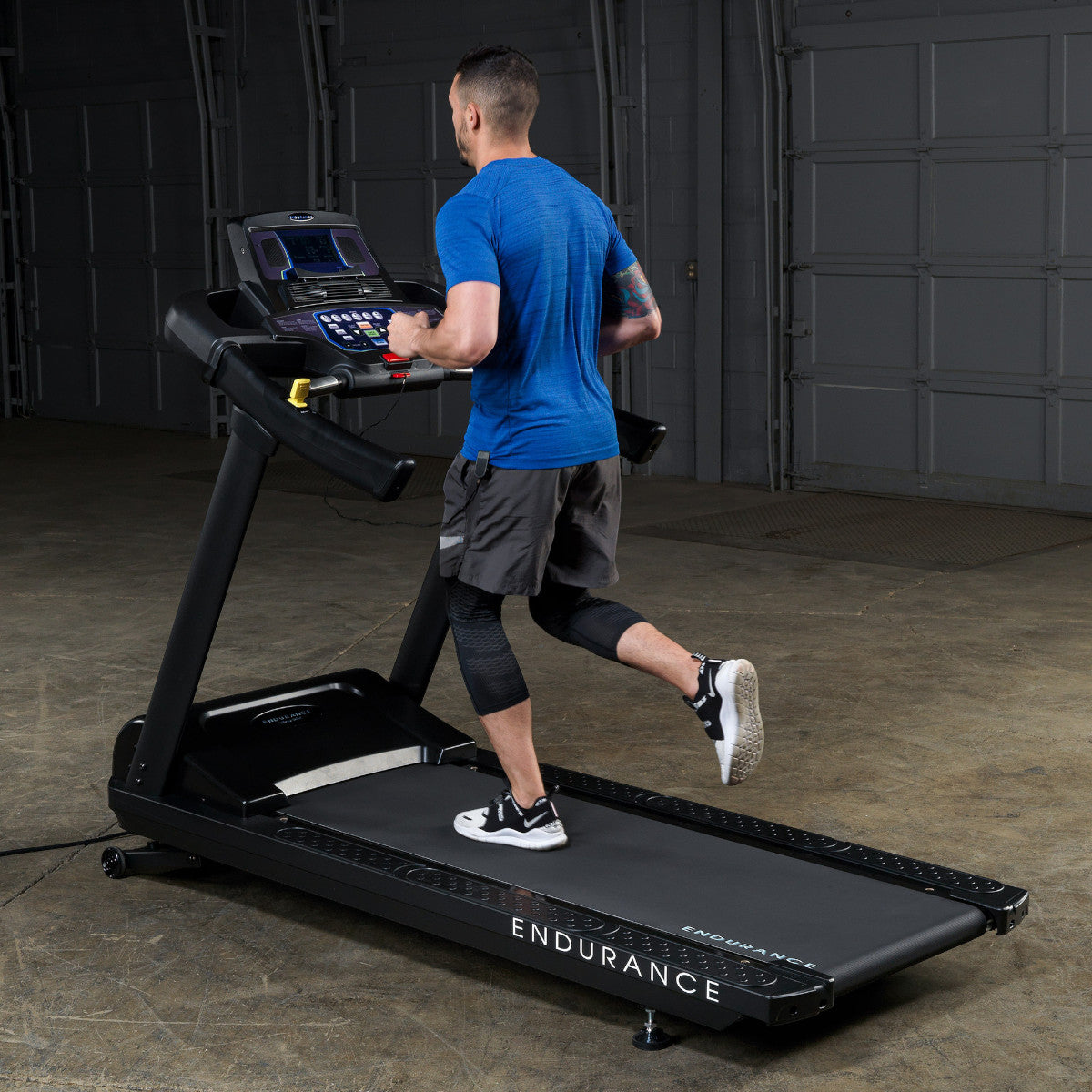 Body-Solid Endurance T150 Commercial Treadmill man running