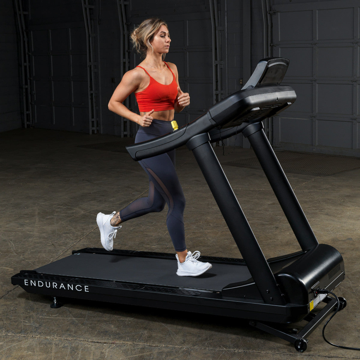 Body-Solid Endurance T150 Commercial Treadmill woman running