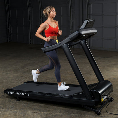 Body-Solid Endurance T150 Commercial Treadmill woman running