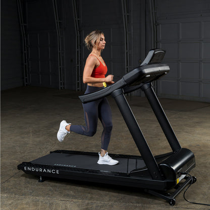 Body-Solid Endurance T150 Commercial Treadmill woman running