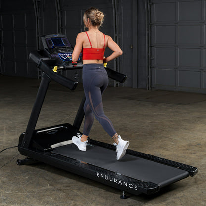 Body-Solid Endurance T150 Commercial Treadmill woman running