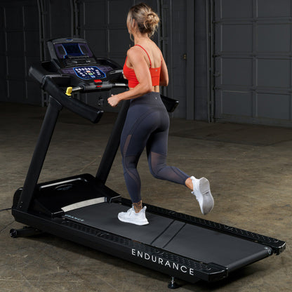 Body-Solid Endurance T150 Commercial Treadmill woman running