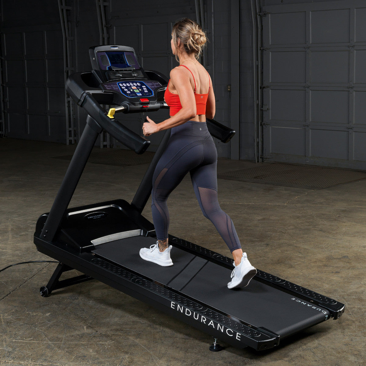 Body-Solid Endurance T150 Commercial Treadmill woman running