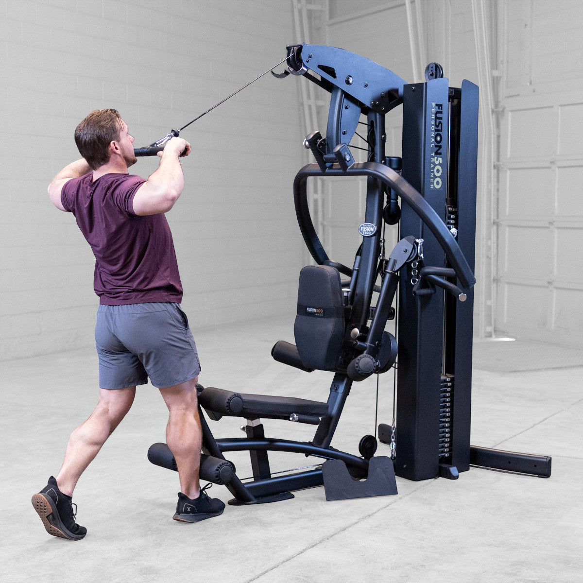 Body-Solid FUSION 500B Personal Trainer Gym with Functional Trainer Arms exercise