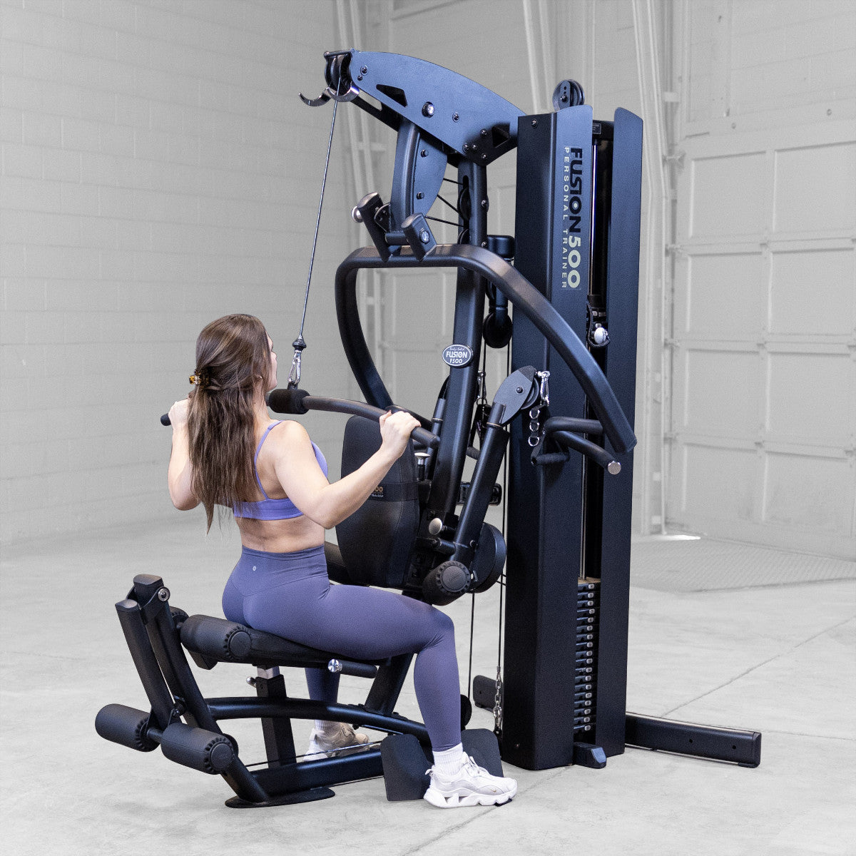 Body-Solid FUSION 500B Personal Trainer Gym with Functional Trainer Arms exercise