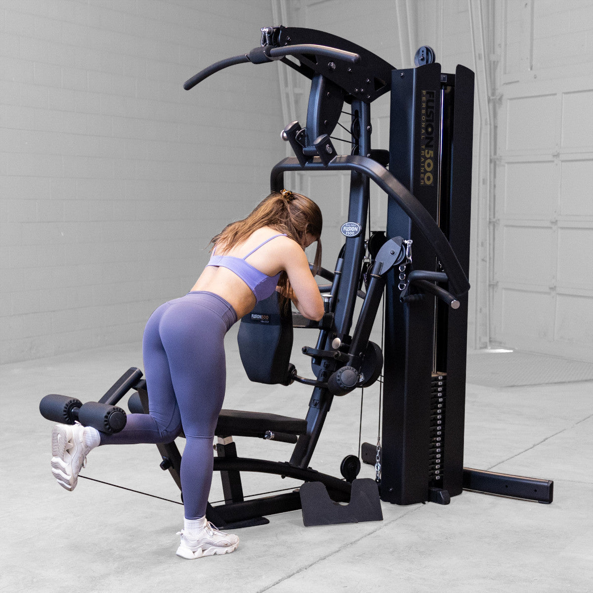 Body-Solid FUSION 500B Personal Trainer Gym with Functional Trainer Arms exercise
