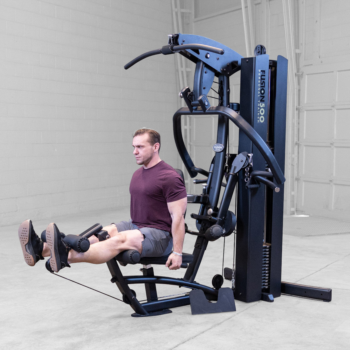 Body-Solid FUSION 500B Personal Trainer Gym with Functional Trainer Arms exercise