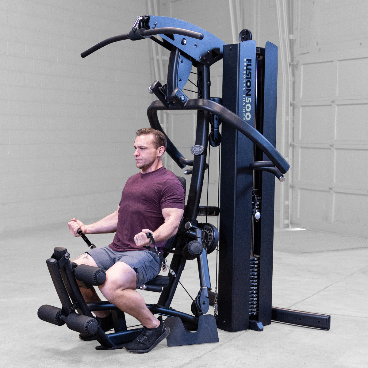 Body-Solid FUSION 500B Personal Trainer Gym with Functional Trainer Arms exercise