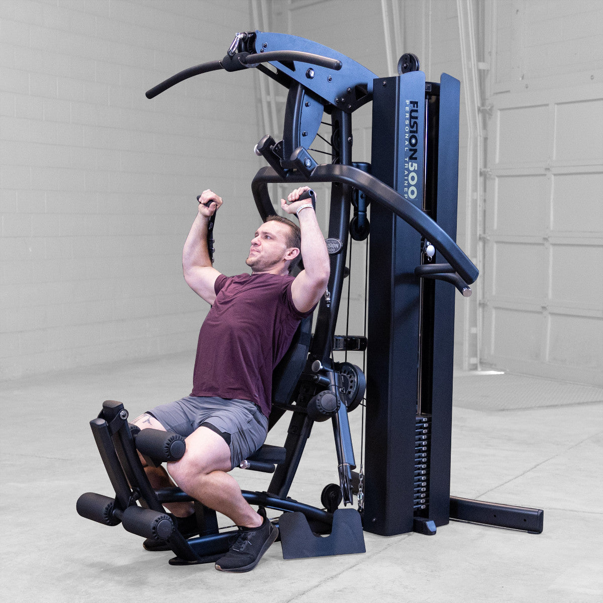 Body-Solid FUSION 500B Personal Trainer Gym with Functional Trainer Arms exercise