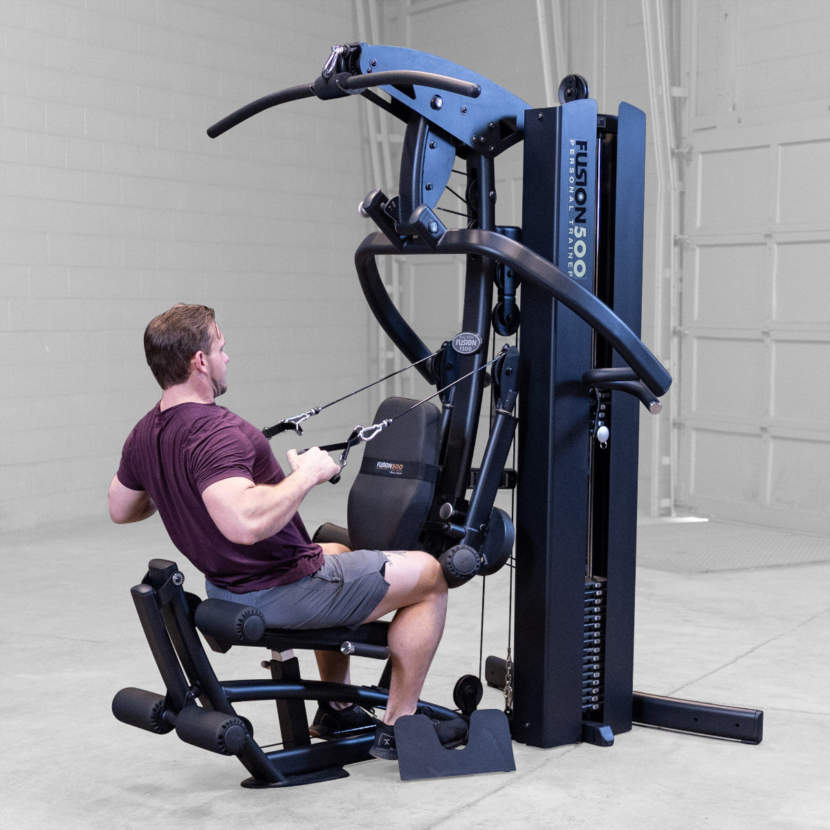 Body-Solid FUSION 500B Personal Trainer Gym with Functional Trainer Arms exercise