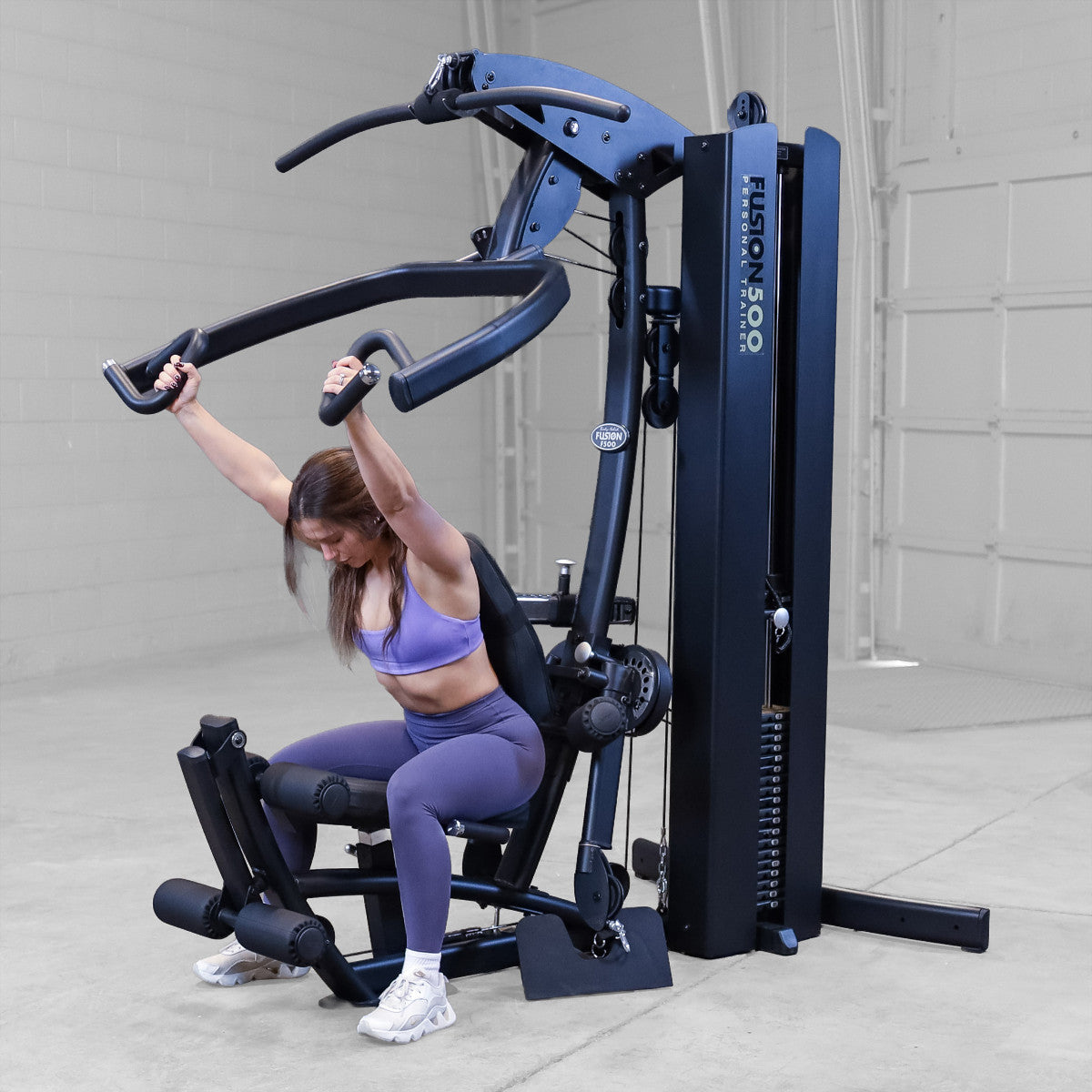 Body-Solid FUSION 500B Personal Trainer Gym with Functional Trainer Arms exercise