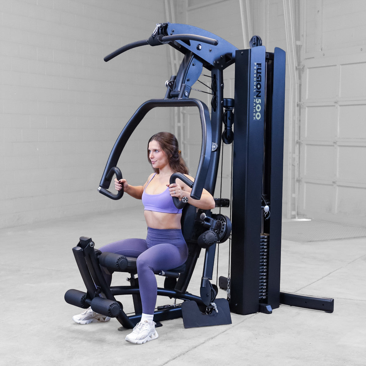 Body-Solid FUSION 500B Personal Trainer Gym with Functional Trainer Arms exercise