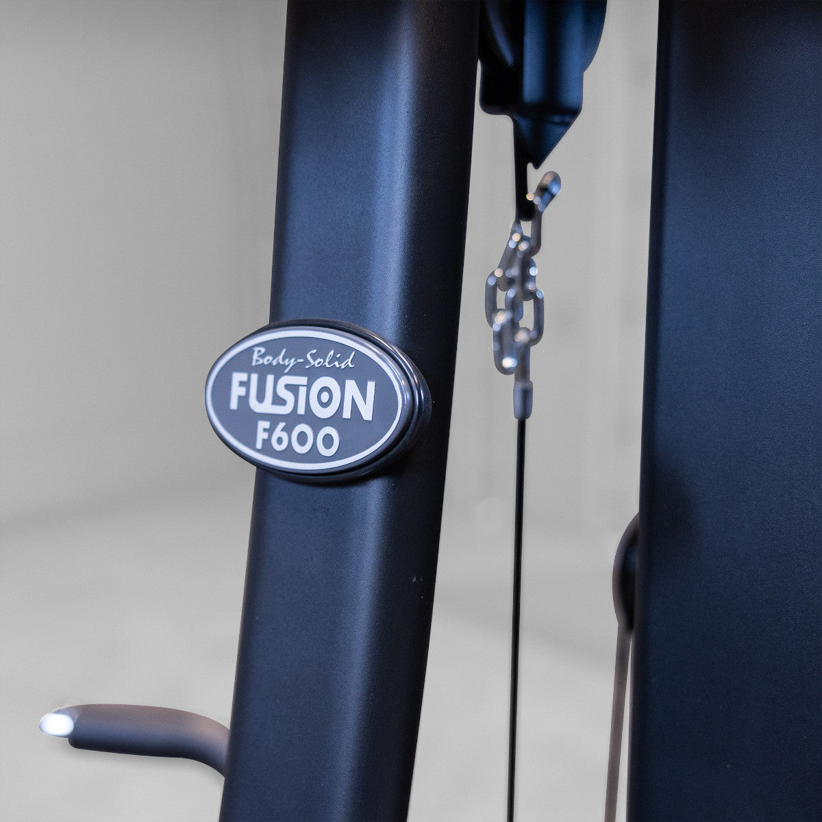 Body-Solid FUSION 600 Bi-Angular Gym with Functional Trainer Arms closeup on white background