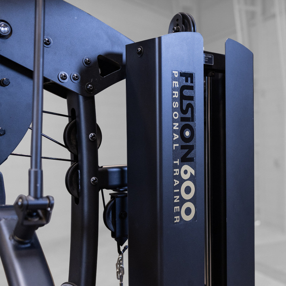 Body-Solid FUSION 600 Bi-Angular Gym with Functional Trainer Arms closeup on white background