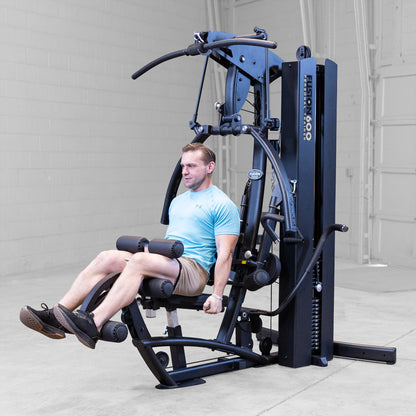 Body-Solid FUSION 600 Bi-Angular Gym with Functional Trainer Arms exercises on white background