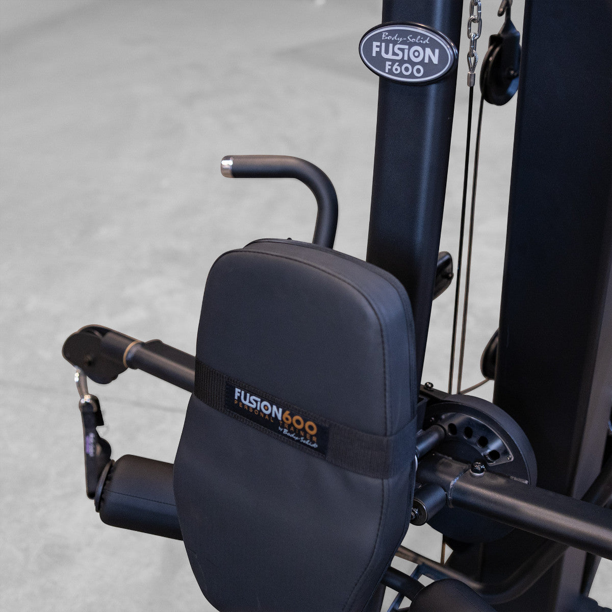 Body-Solid FUSION 600 Bi-Angular Gym with Functional Trainer Arms closeup on white background