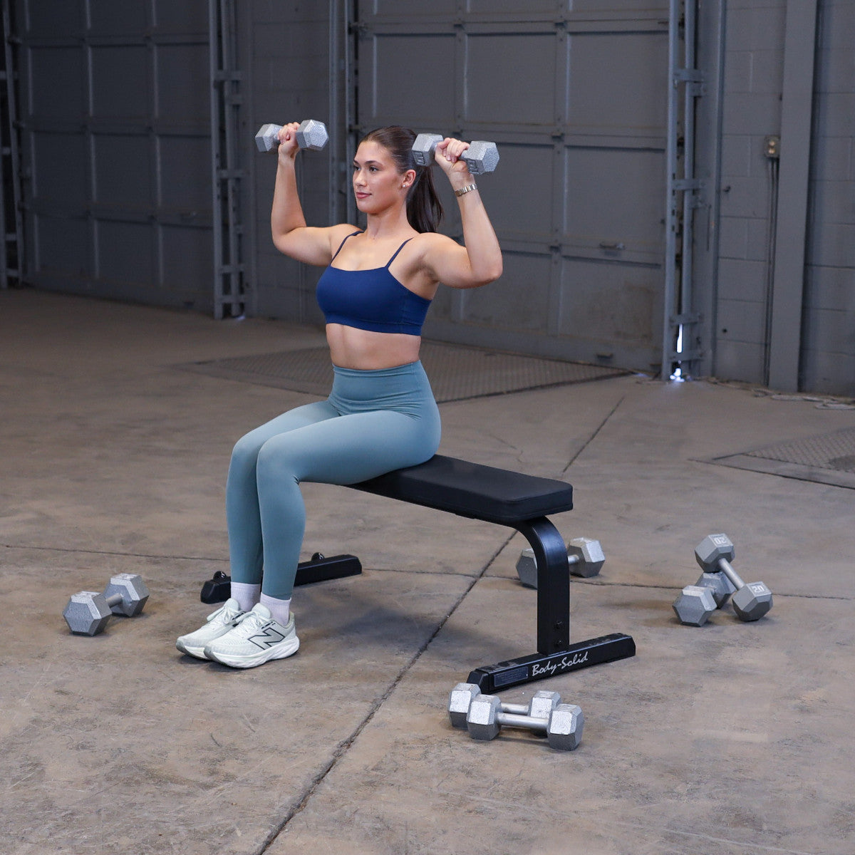Body-Solid GFB350B Flat Bench woman exercising