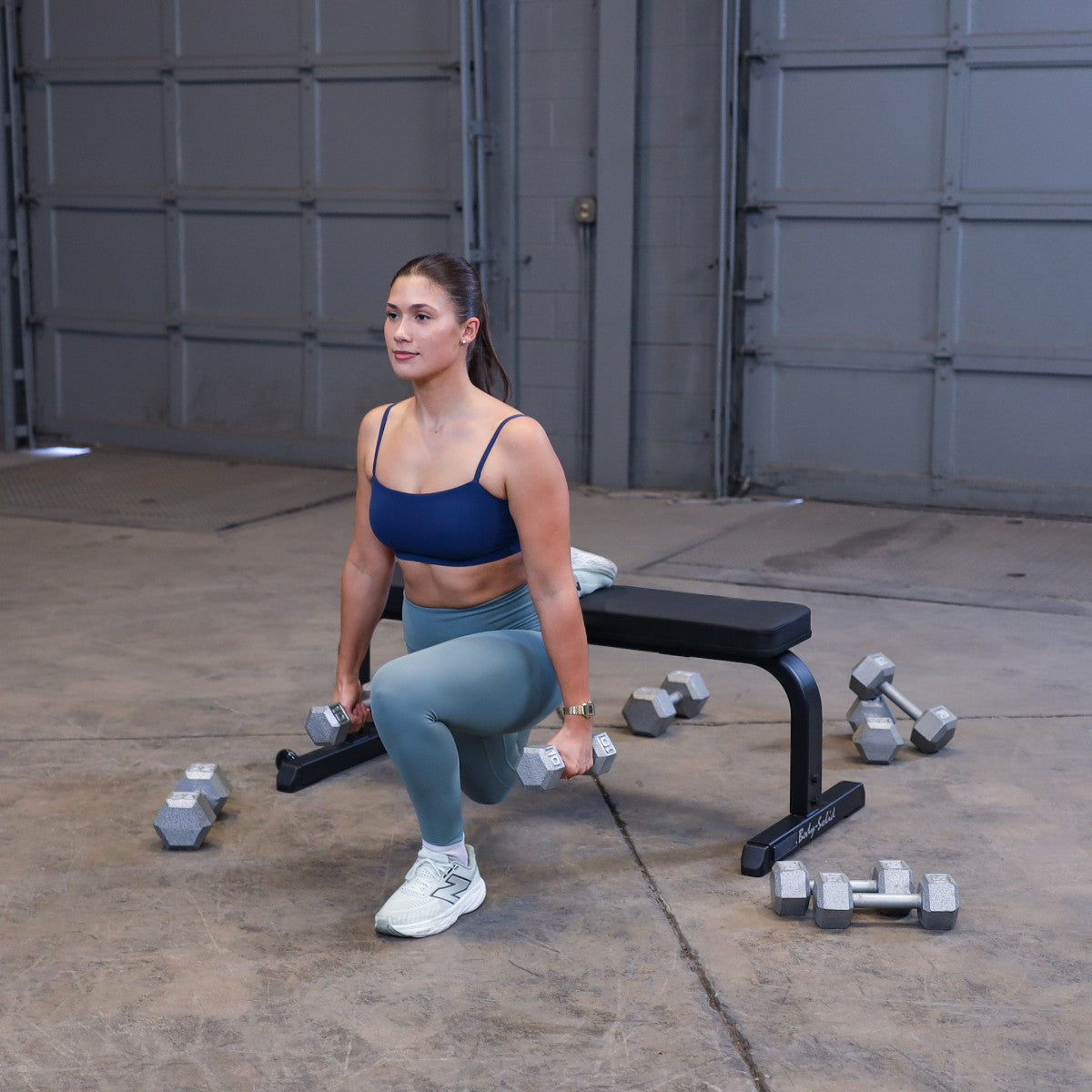 Body-Solid GFB350B Flat Bench woman exercising