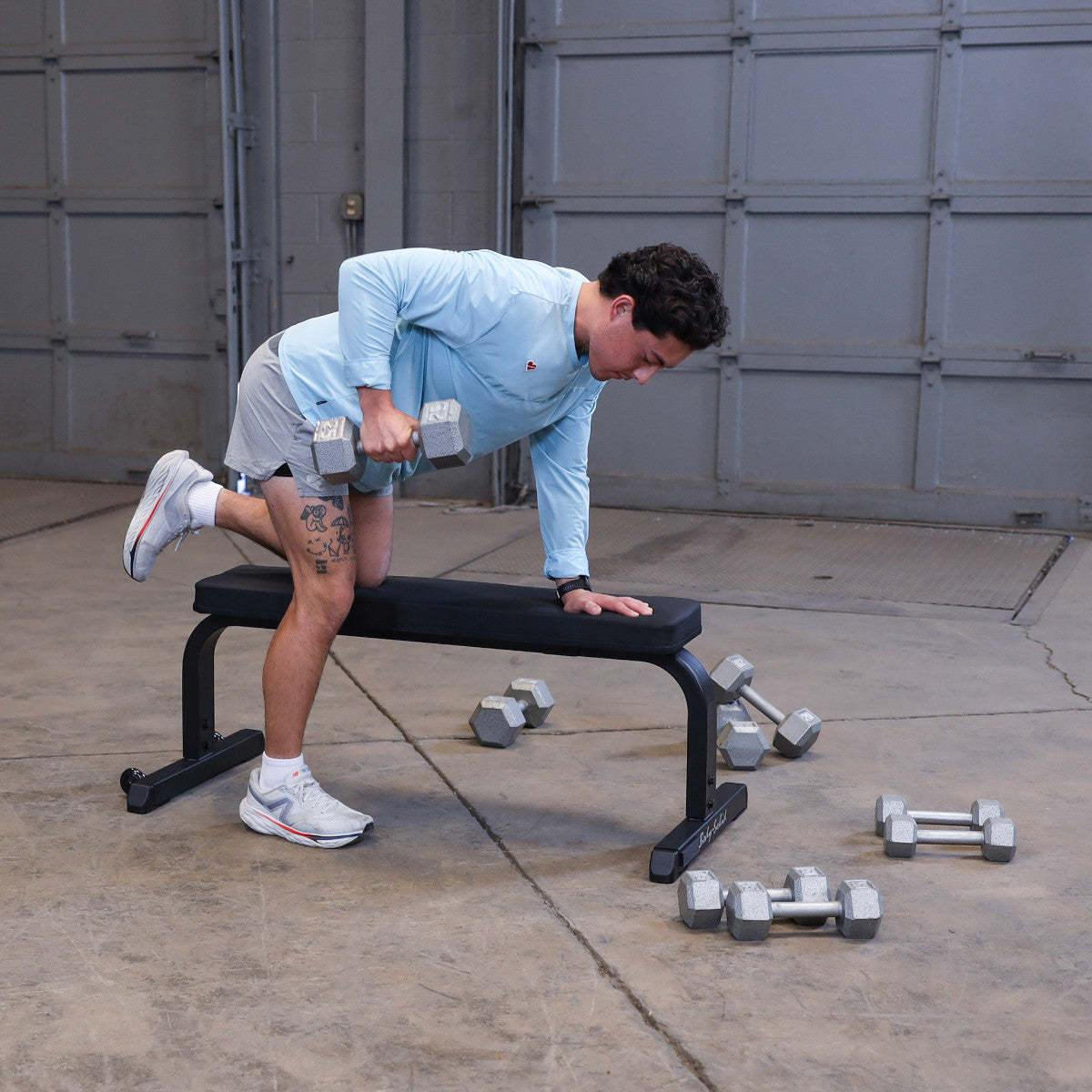 Body-Solid GFB350B Flat Bench man exercising