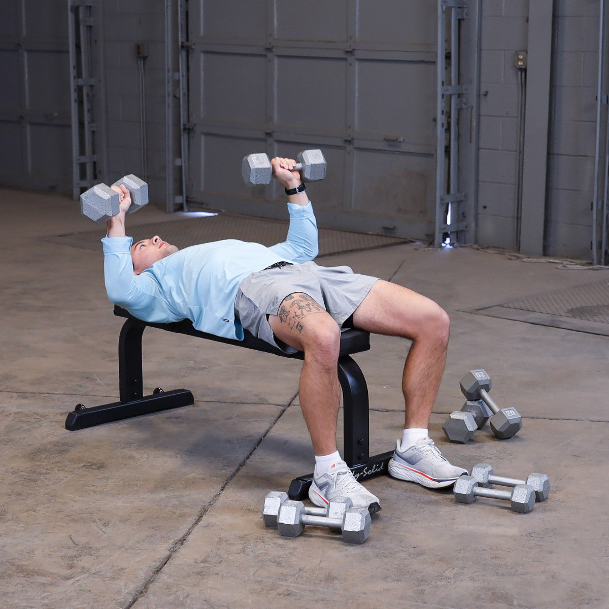 Body-Solid GFB350B Flat Bench man exercising