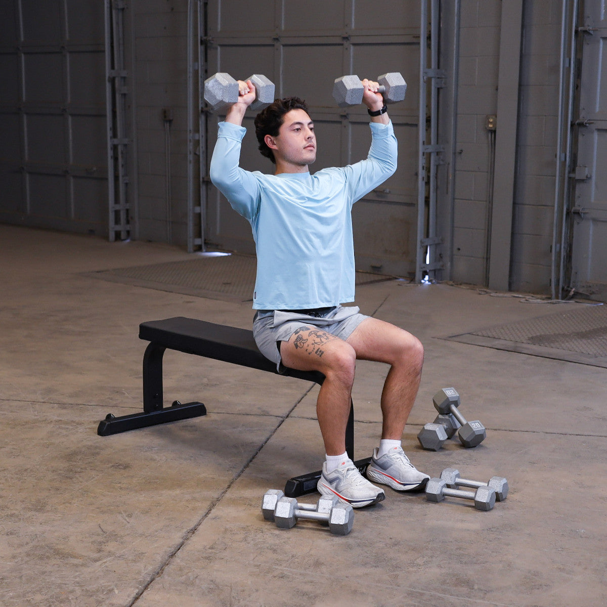 Body-Solid GFB350B Flat Bench man exercising