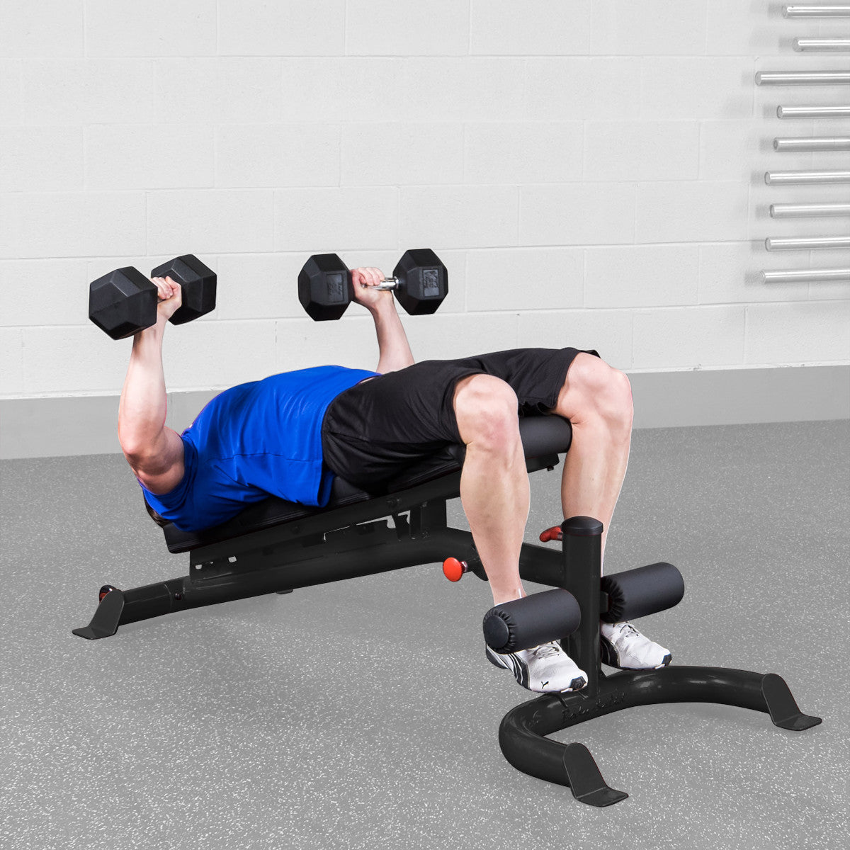 Body-Solid GFID100B Flat Incline Decline Bench man doing decline dumbbell press