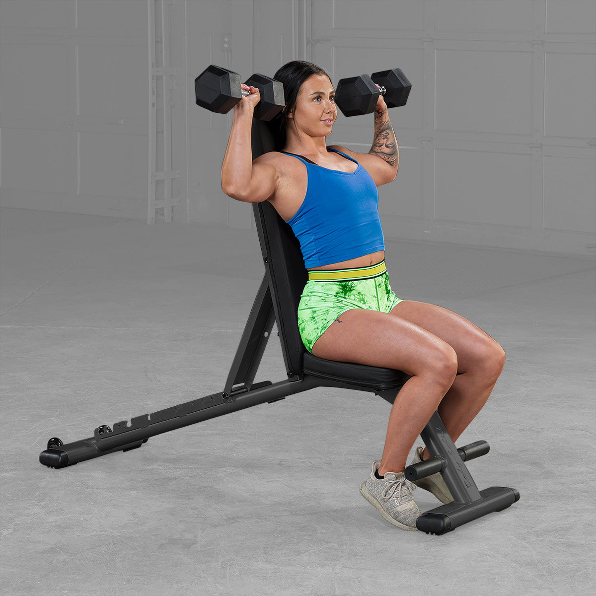 Body-Solid GFID225B Commercial Folding FID Weight Bench woman exercising