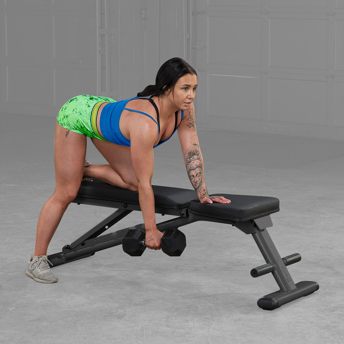Body-Solid GFID225B Commercial Folding FID Weight Bench woman exercising