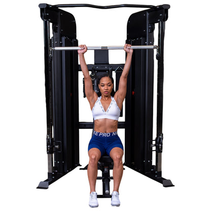 Body-Solid GFT100 Functional Trainer exercise on white background