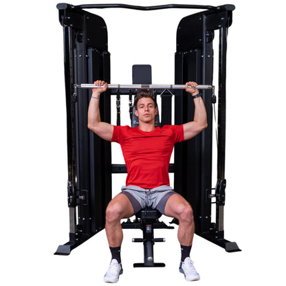 Body-Solid GFT100 Functional Trainer exercise on white background