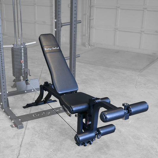 Body-Solid GLEG Leg Ext and Leg Curl Bench Attachment connected to rack plate stack