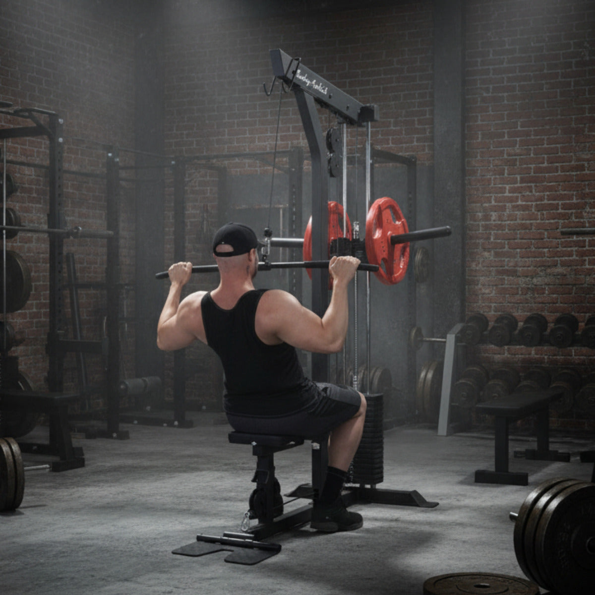 Body-Solid GLM85B Lat Machine man exercising in gym