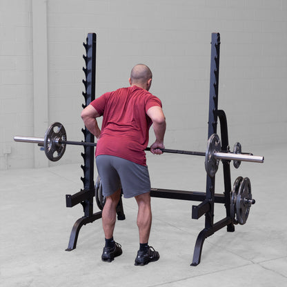 Body-Solid GPR370B Olympic Multi Press Rack man exercising