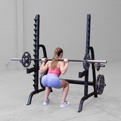 Body-Solid GPR370B Olympic Multi Press Rack woman exercising