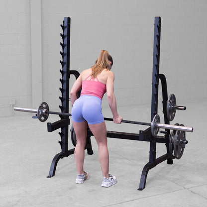 Body-Solid GPR370B Olympic Multi Press Rack woman exercising
