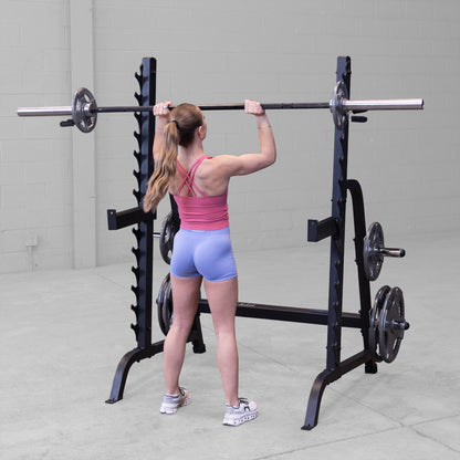 Body-Solid GPR370B Olympic Multi Press Rack woman exercising