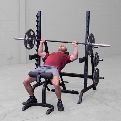 Body-Solid GPR370B Olympic Multi Press Rack man exercising
