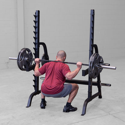 Body-Solid GPR370B Olympic Multi Press Rack man exercising