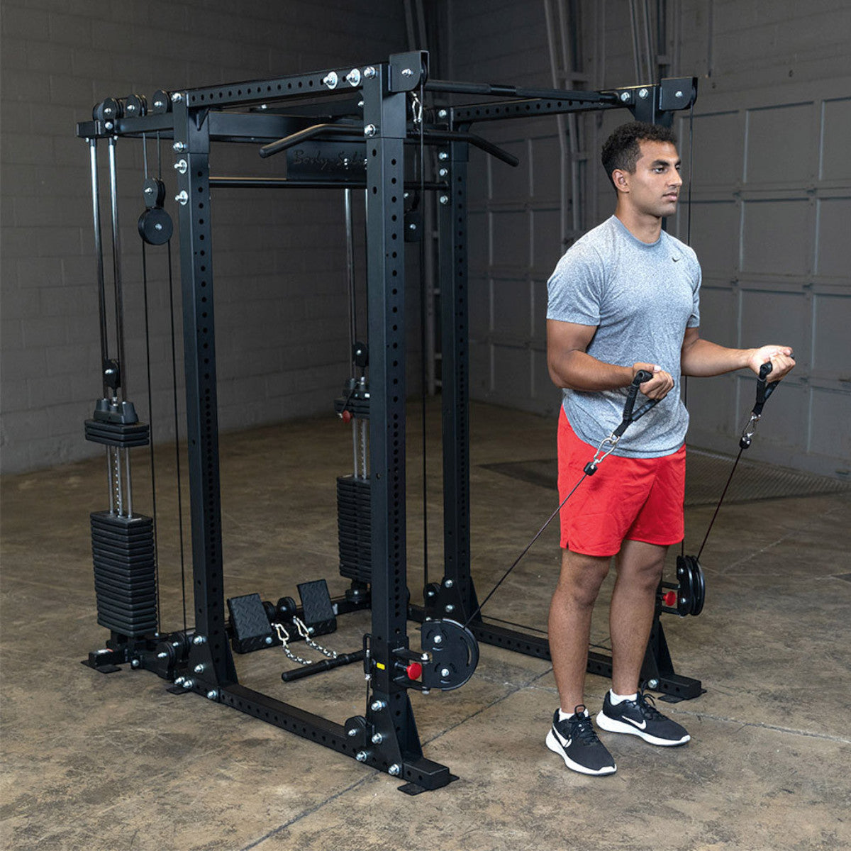 Body-Solid GPR400 Heavy Duty Power Rack Functional Trainer Option man exercising
