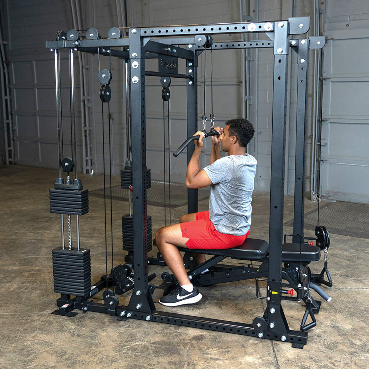 Body-Solid GPR400 Heavy Duty Power Rack Functional Trainer Option man exercising