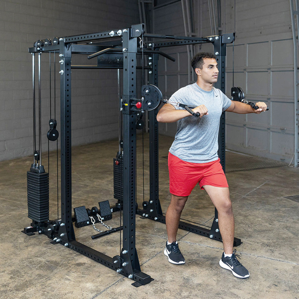 Body-Solid GPR400 Heavy Duty Power Rack Functional Trainer Option man exercising