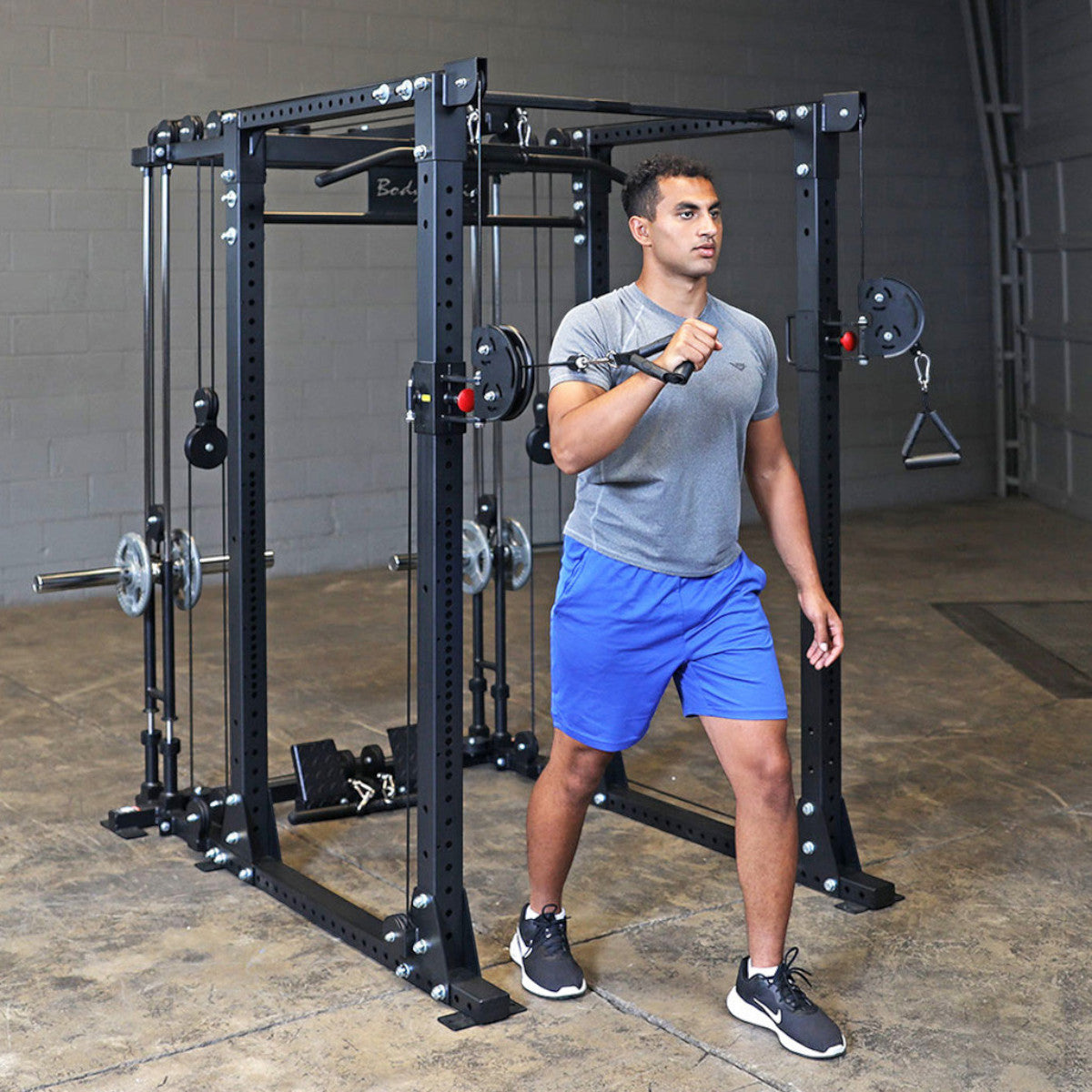 Body-Solid GPR400 Heavy Duty Power Rack Functional Trainer Option man exercising